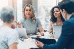 women and man in a business meeting