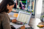 woman looking a financial documents